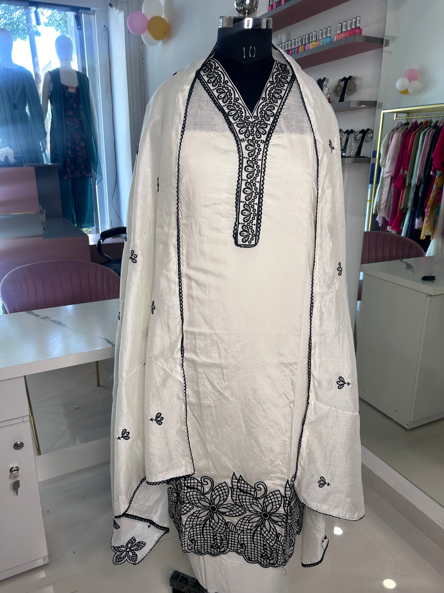 Chic Unstitched White Muslin Suit - Elegant Neckline, Santoon Bottom, and Muslin Dupatta