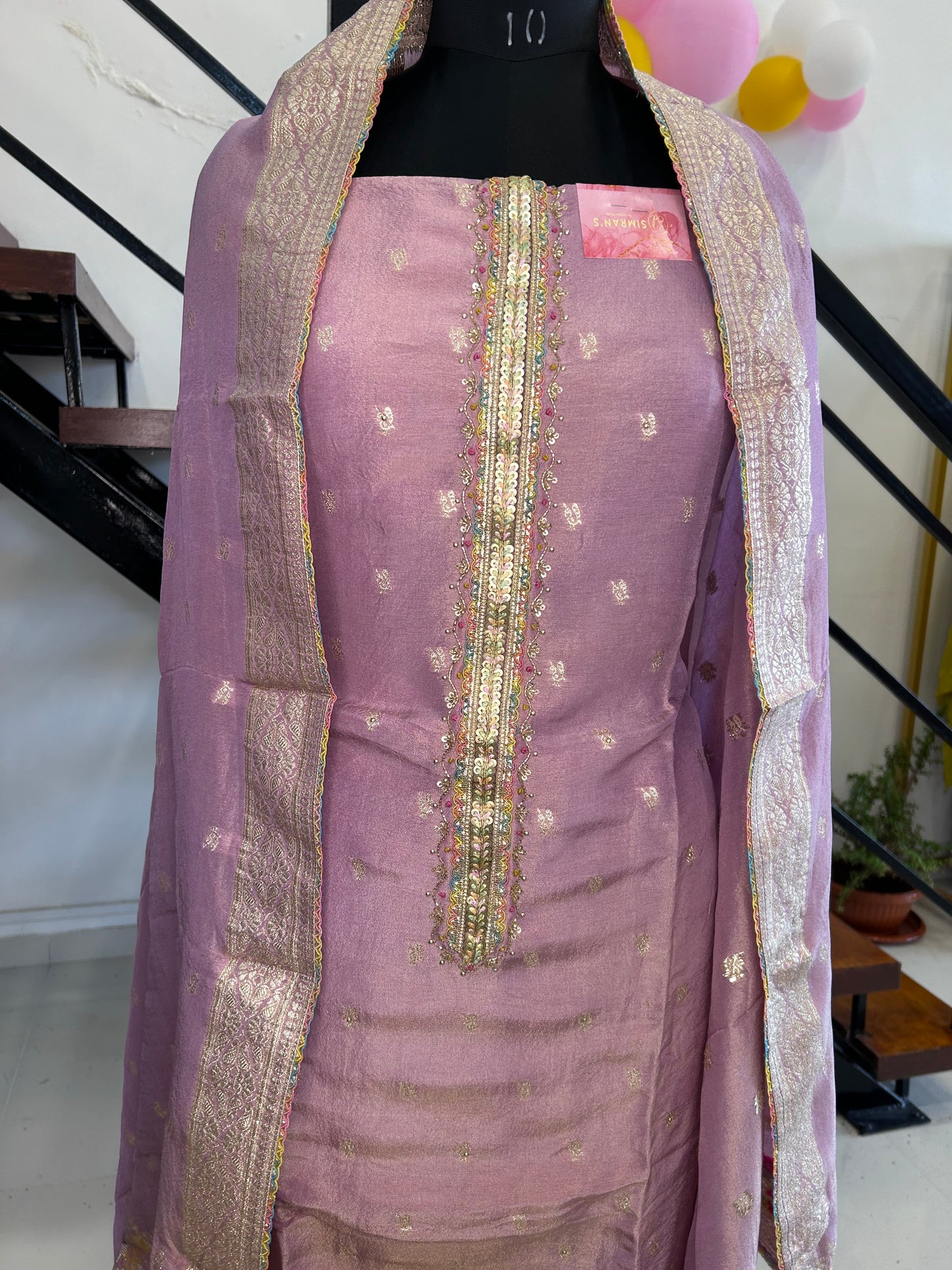 Graceful Chanderi Suit with Elegant Neckline and Matching Dupatta